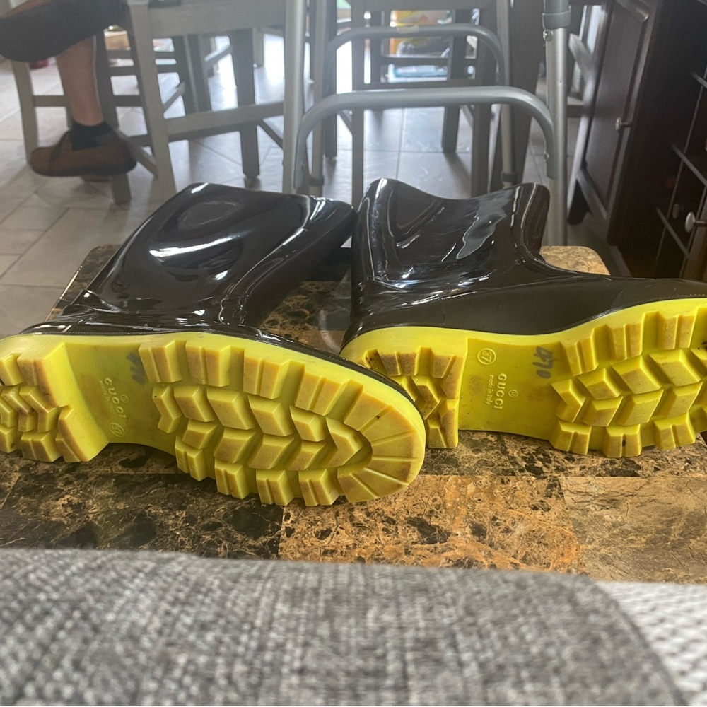Gucci rain boots. Barely used and in great condition!  Black with neon yellow.
